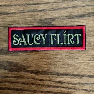Cute fun embroidered patch with French accent "Saucy Flirt" red olive and black